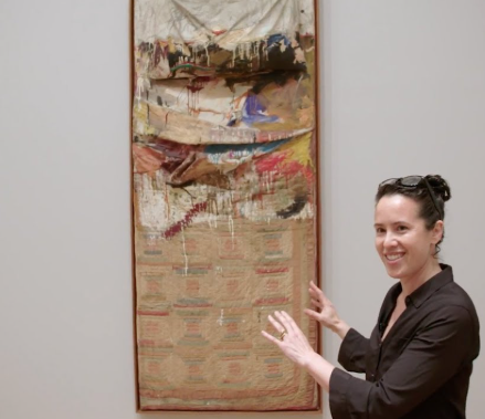 Robert Rauschenberg, Bed, quilt and pillow with paint on wall.